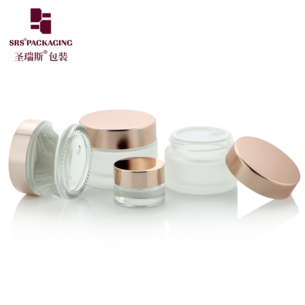 J319 Customized cosmetic glass cream jars 5ml 10ml 15ml 30ml 50ml clear jar with rose gold cap