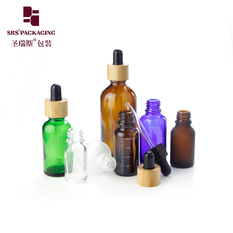 wholesale high quality thick wall glass bottle nature 30ml green blue amber frosted glossy  glass dropper bottle bamboo
